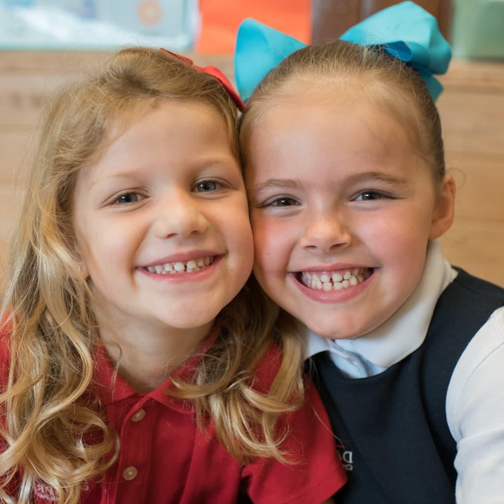 Pre-k students smiling while in class at Dayspring Christian Academy